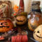 My work table holds four pumpkin gourds waiting for their Halloween hat. 